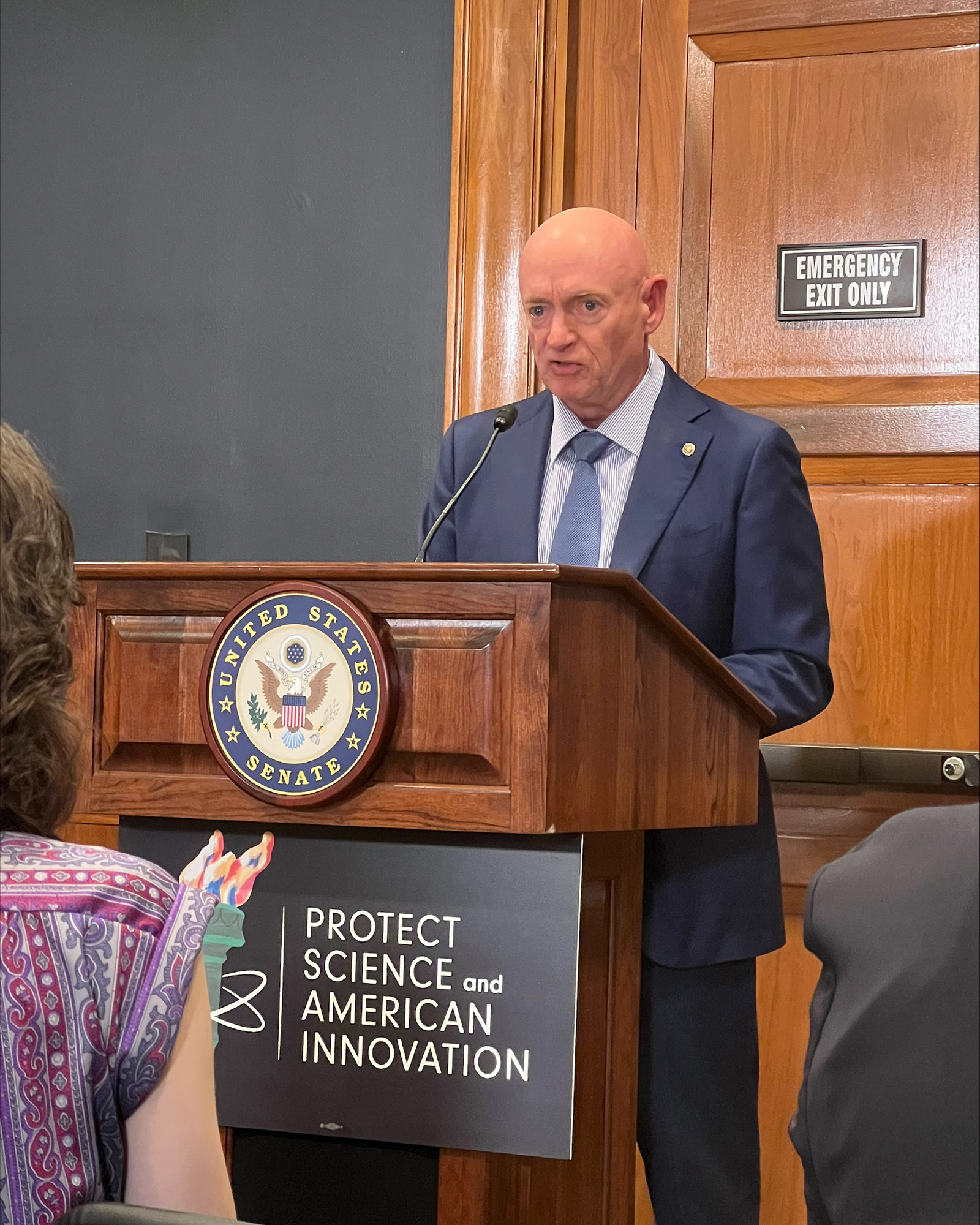 Sen. Mark Kelly speaks at PSAI’s National Day of Action.